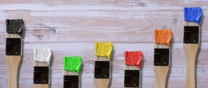 paint brushes with different color paints
