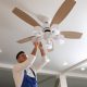 Professional ceiling fan installation in a residential home