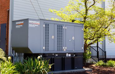 Generac Backup Generator Technology outside an apartment complex