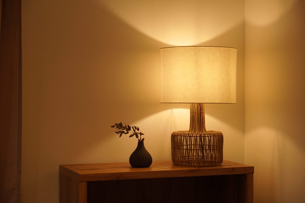 Lamp lit up on accent table