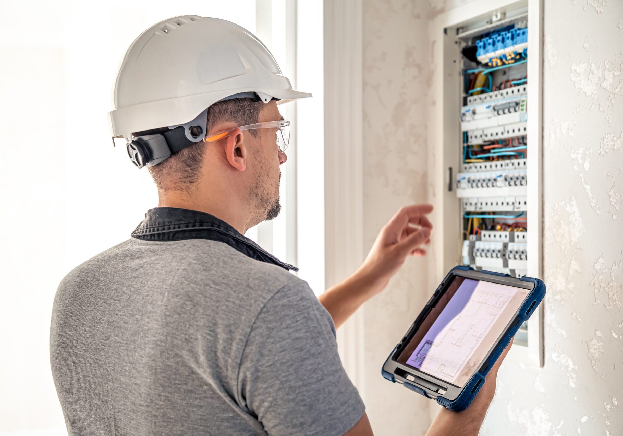 Electrician Checking An Electrical Panel